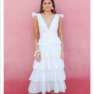 Worn once for my bridal shower. Will be dry cleaned before shipping, great dress